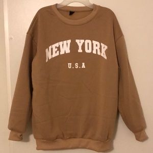 Brand new women’s sweat shirt.